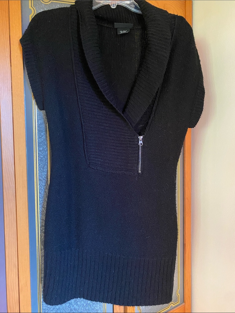 Black Short-Sleeve Shawl Collar Sweater with Zip Detail. Perfect layering piece!